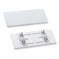 Dekkplate universal for utskift av innfelt nødlysarmatur